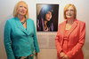 The Presiding Officer, Tricia Marwick MSP and Deputy Presiding Officer, Elaine Smith, with the winning entry of the World Press Photo Exhibition 2011